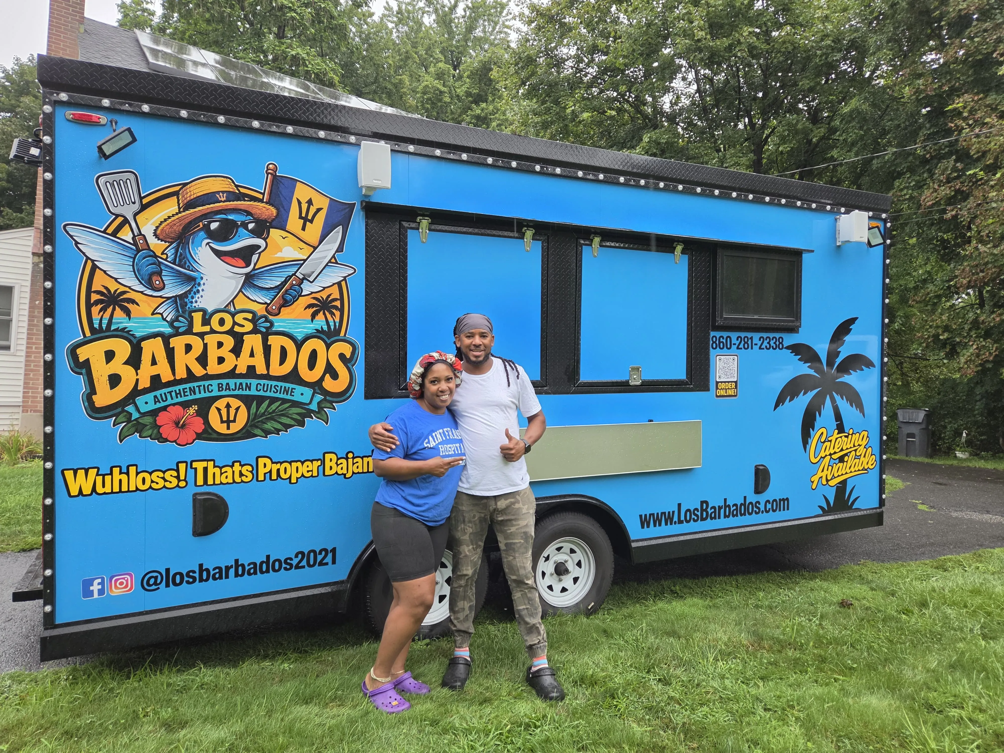 Mark and Marisa Belgrave in front of the Los Barbados trailer